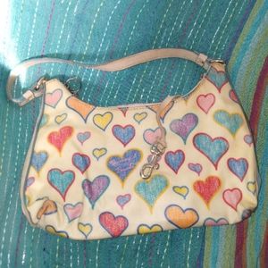 Dooney and Bourke - mini dooney - wristlet - clutch - small luxury